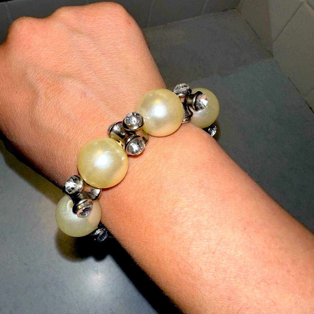 Elegant Silver and Cream Bracelet